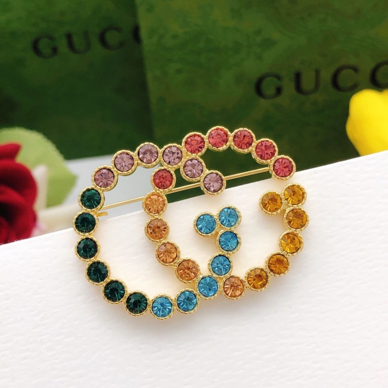 Gvc*1 brooches